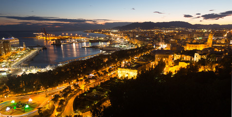 View of Malaga and Mediterranean port in  evenin