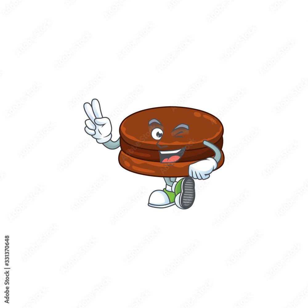 Sticker A joyful chocolate alfajor mascot design showing his two fingers