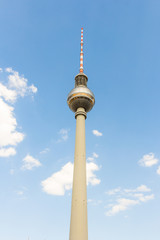 Television tower (Fernsehturm Berlin), Marien quarter, Berlin, Germany. Beautiful low angle shot (POV) on a sunny summer day. Tallest structure in Germany. Vertical. © Julien