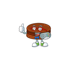 Talented chocolate alfajor gamer mascot design using controller