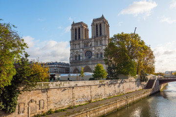Fototapeta na wymiar Notre-Dame de Paris, France. This gothic medieval monument caught fire on april 15 2019. Currently this catholic cathedral is being renovated (construction). Worldwide monument.