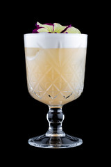 Exquisite cold cocktail with pear and peach on a dark background