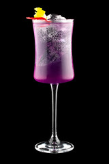 Exquisite cold cocktail with rum and Thai blue tea on a dark background