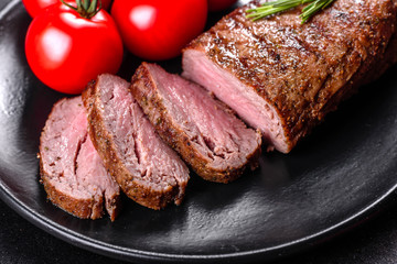 Ribeye steak with potatoes, onions and cherry tomatoes