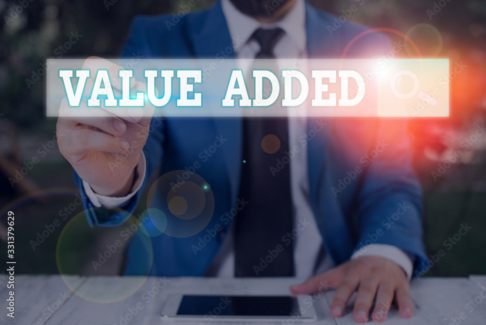 Poster conceptual hand writing showing value added. concept meaning the extra value created over and above 