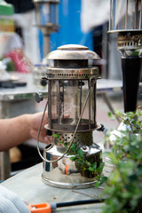 Ancient hurricane lamp Which is collectible, was included for the performance.