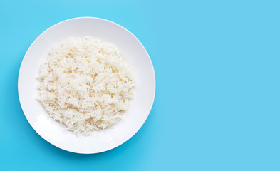 Dish of rice on blue background.