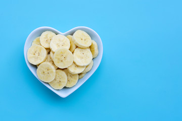 Banana slices on blue  background.
