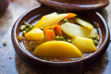 Potato, carrot, tomato, peas vegetable tajine, Morocco 