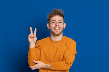 Attractive young guy with a yellow T-shirt