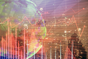 Double exposure of forex chart drawings over cityscape background. Concept of success.