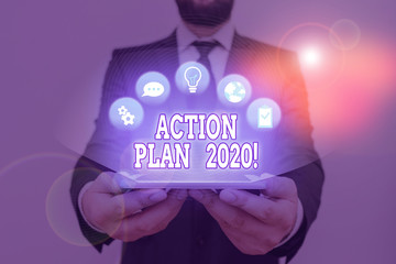 Conceptual hand writing showing Action Plan 2020. Concept meaning proposed strategy or course of...