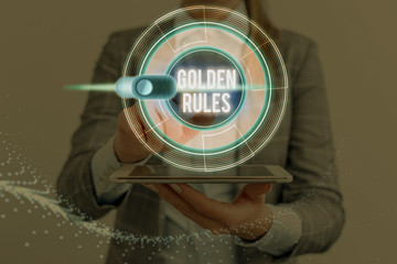Conceptual hand writing showing Golden Rules. Concept meaning basic principle that should always...