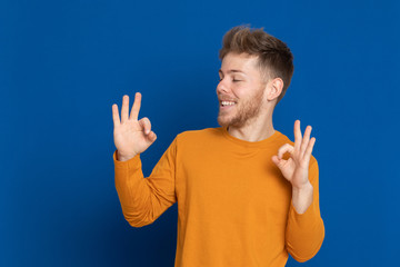 Attractive young guy with a yellow T-shirt