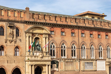 Obraz premium Bologna city hall, ancient Accursio palace, XIII century, with the statue of Pope Gregorio XIII and the Virgin Mary. Emilia-Romagna, Italy, Europe