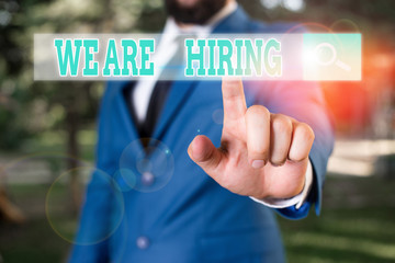 Conceptual hand writing showing We Are Hiring. Concept meaning recently you employ someone or pay...