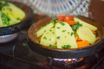 Potato, carrot, tomato, peas vegetable tajine, Morocco 
