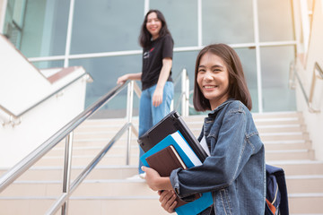 College students walking up the stairs