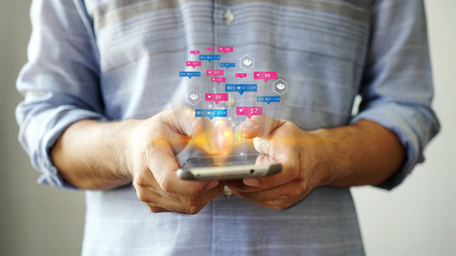 Social media and notification icons on smartphone. Media marketing concept.