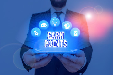 Conceptual hand writing showing Earn Points. Concept meaning collecting scores in order qualify to...