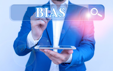 Writing note showing Bias. Business concept for inclination or prejudice for or against one...