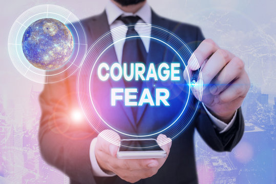 Handwriting text Courage Fear. Conceptual photo quality of mind that enables a demonstrating to face difficulty Elements of this image furnished by NASA