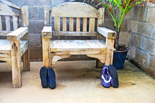Beach Shoes by Wood Chair