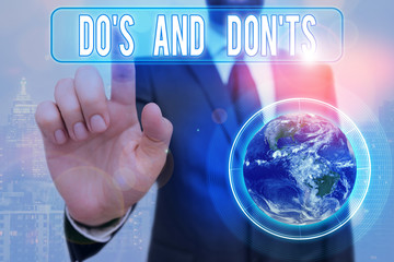 Writing note showing Dos And Don tS. Business concept for Rules or customs concerning some activity...