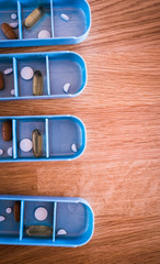 Daily pill box with medical pills  with copy space