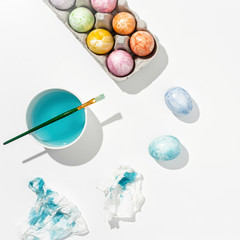 Happy Easter! Holiday traditions coloring Easter eggs.