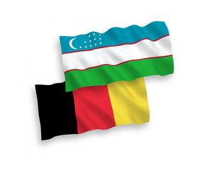 Flags of Belgium and Uzbekistan on a white background