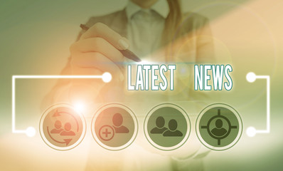 Conceptual hand writing showing Latest News. Concept meaning information that is being received and...