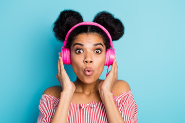Closeup photo of funny dark skin lady listen music modern earphones open mouth favorite song on...