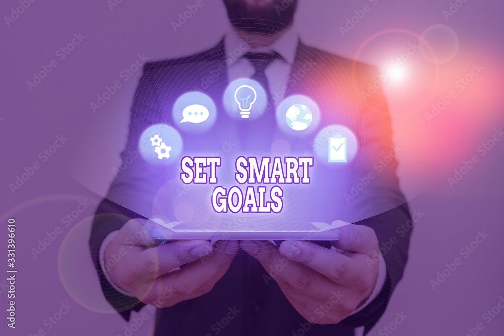 Poster conceptual hand writing showing set smart goals. concept meaning list to clarify your ideas focus ef