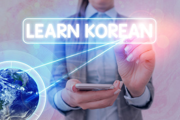 Text sign showing Learn Korean. Business photo text get knowledge or skill in speaking and writing...