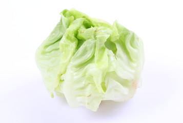 Green cabbage isolated over white background