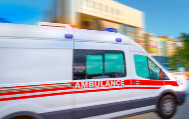 Ambulance in the city on a blurred background