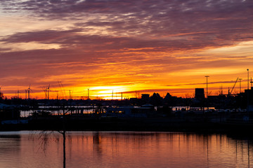 Fototapeta premium Sunrise at the river Warnow in Rostock, Germany