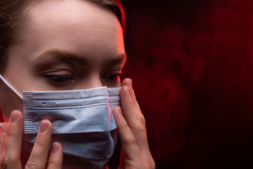 A girl in a protective mask from the virus of the coronavirus. Mass epidemic, pandemic in the USA