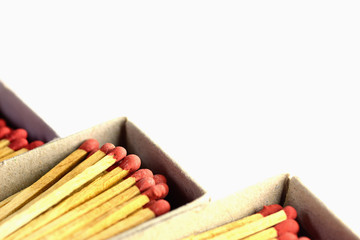 Matches in box isolated on white background.