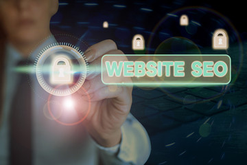 Writing note showing Website Seo. Business concept for tactics used to increase the amount of...