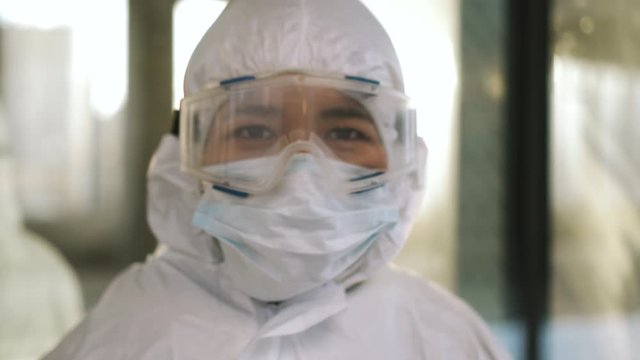 Portrait of epidemiologist protecting patients from coronavirus COVID-19 in mask