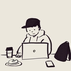 カフェでパソコン作業する若者（モノクロ）