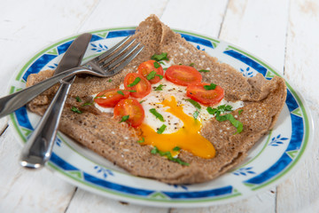 Breton crepe with egg and tomatoes