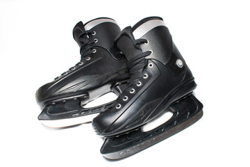 Black pair of figure skates. Skates for man going on ice, on white background