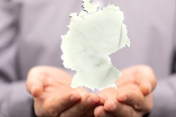 3D map of Germany. Map of Germany land border with flag. Germany map on white background. 3d rendering.