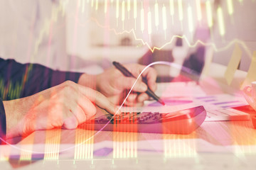 Fototapeta premium Financial trading graph multi exposure with man desktop background.