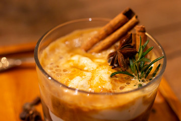 An Affogato is an Italian coffee-based dessert. It usually takes the form of a scoop of vanilla gelato or ice cream topped or drowned with a shot of hot espresso. Some variations also include a shot.