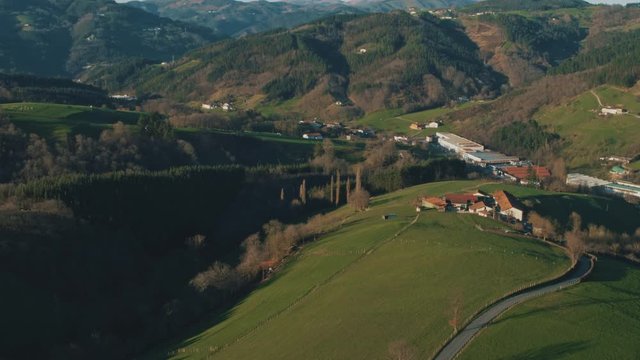 4K Aerial Basque Country industrial town in rural landscape