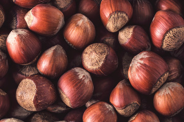 Hazelnuts. Stack of hazelnuts. Food background. Hazelnuts texture. Top view